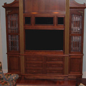 Entertainment Center, freestanding: stained and glazed cherry.