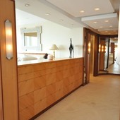 Dressing Room with closets and entryway doors, built-in: glass, natural anigre a