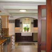 Kitchen, built-in: granite, mahogany, quilted and natural maple 