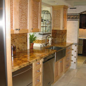 Kitchen, built-in: granite, quilted and natural maple