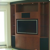 TV/Display Cabinet, built-in: natural kevazinga with black lacquered mahogany.